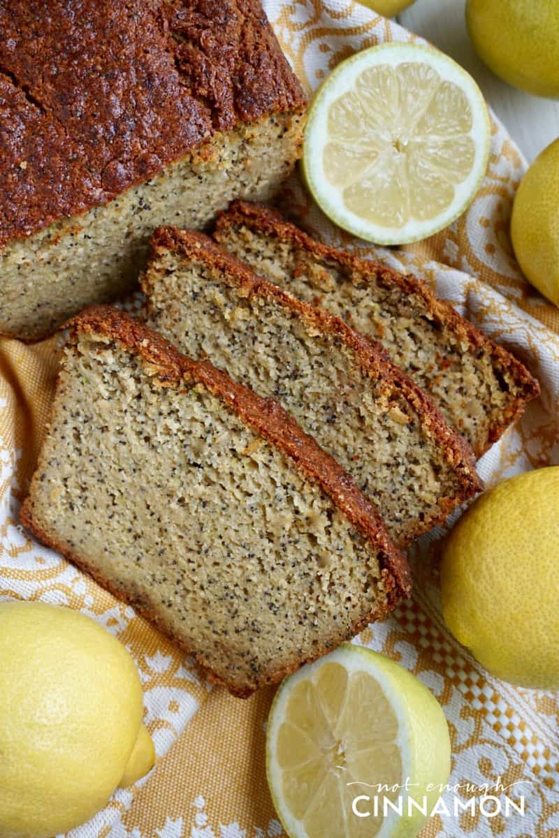 a moist paleo zucchini bread with lemon and poppy seeds cut into slices 