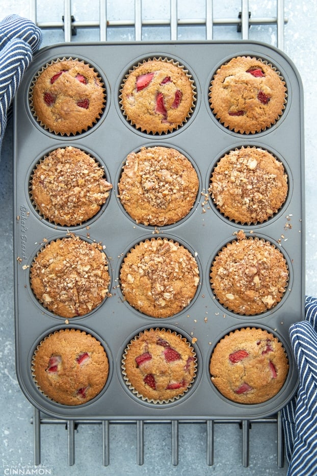 Healthy strawberry muffins in a muffin tin right out of the oven