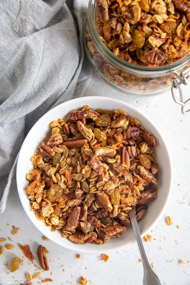 overhead shot of a bowl filled with carrot cake granola 