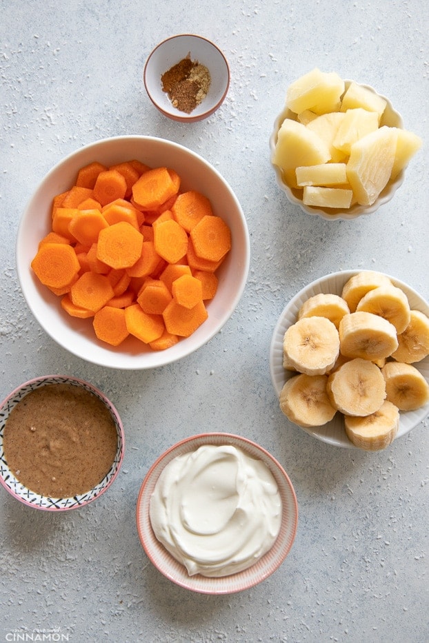 overhead shot of ingredients needed for making carrot cake smoothie 