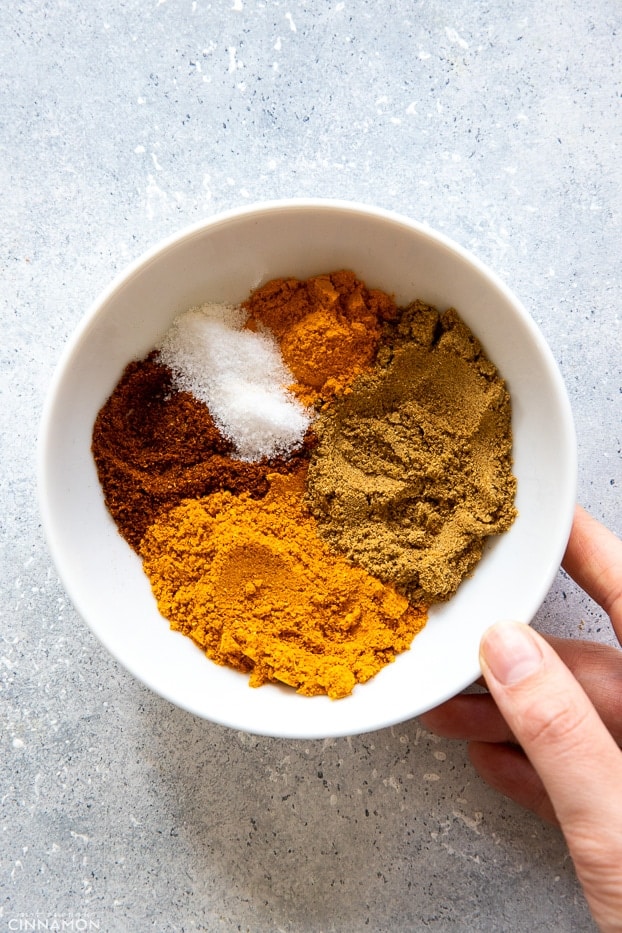 butter chicken spice blend in a small white bowl 