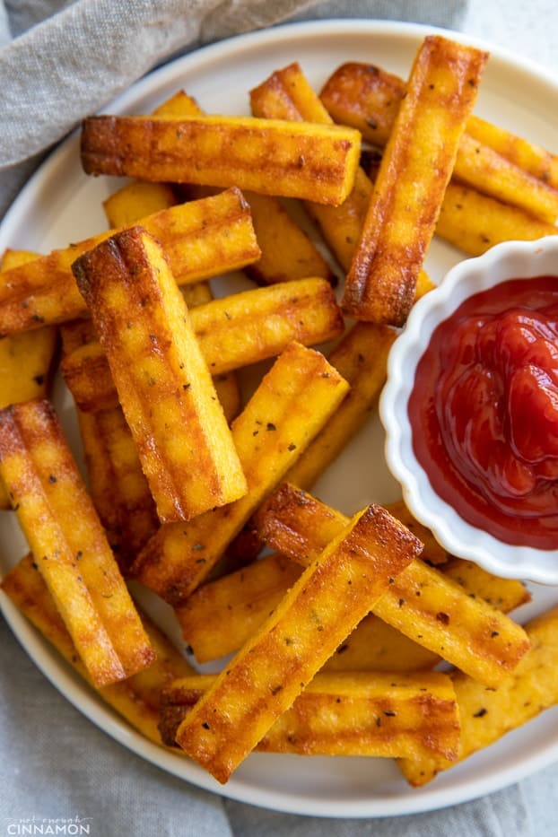 overhead shot of a plate of healthy baked polenta fries 