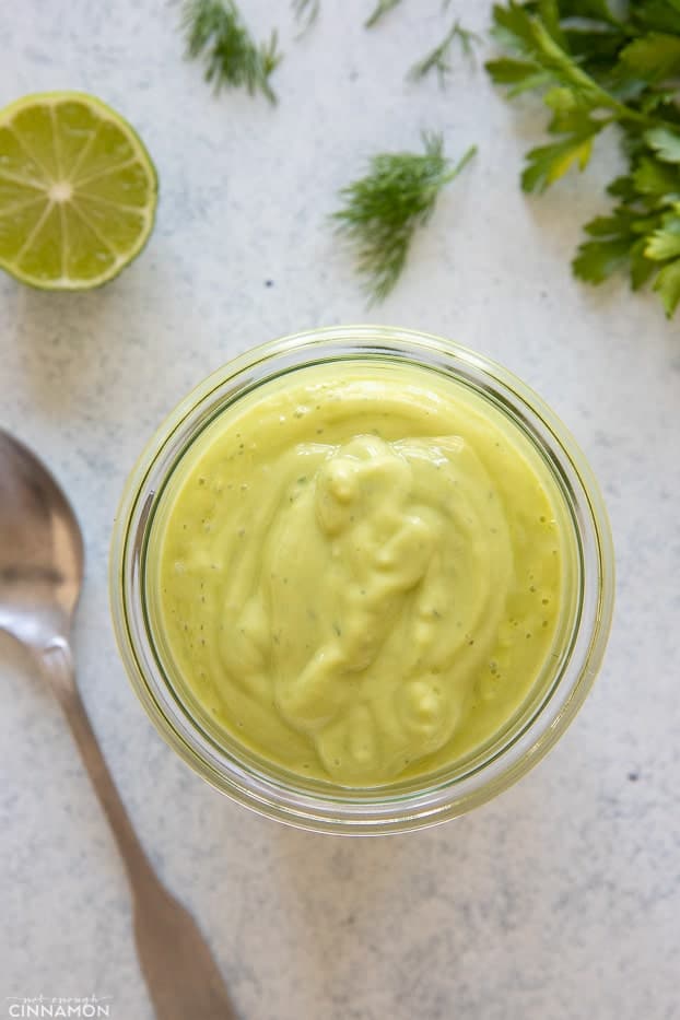 overhead shot of a mason jar with avocado ranch dressing