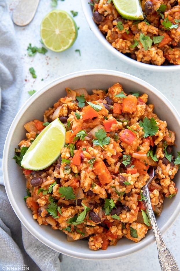 overhead shot of Mexican Fried Rice Ground Turkey Bowls sprinkled with fresh cilantro 