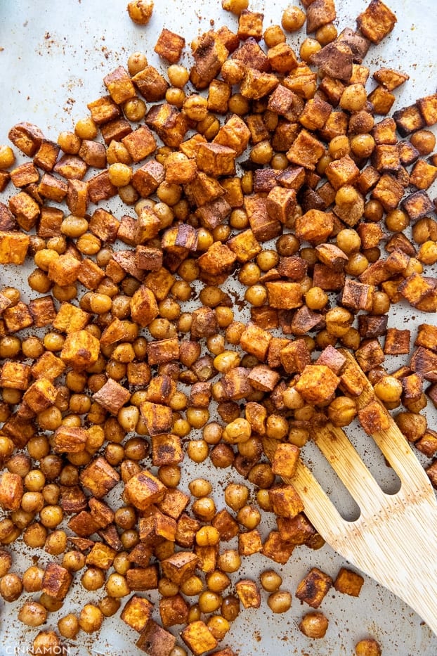 overhead shot of roasted sweet potatoes and chickpeas with spices
