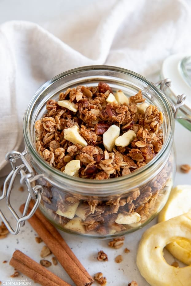 healthy glutenfree vegan apple pie granola on a glass mason jar 