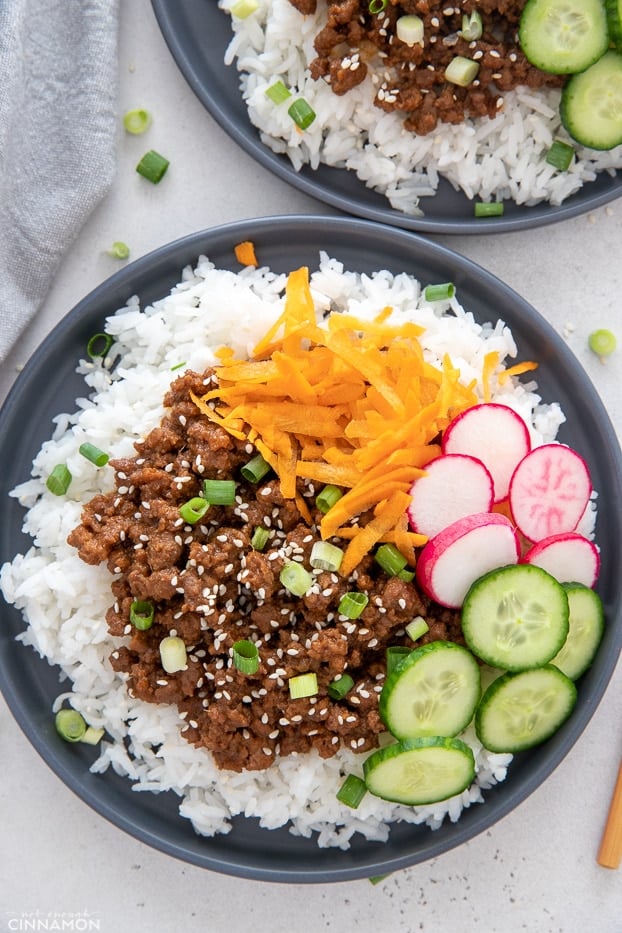 overhead shot of a healthy Korean Ground Beef Bowl served with assorted vegetables