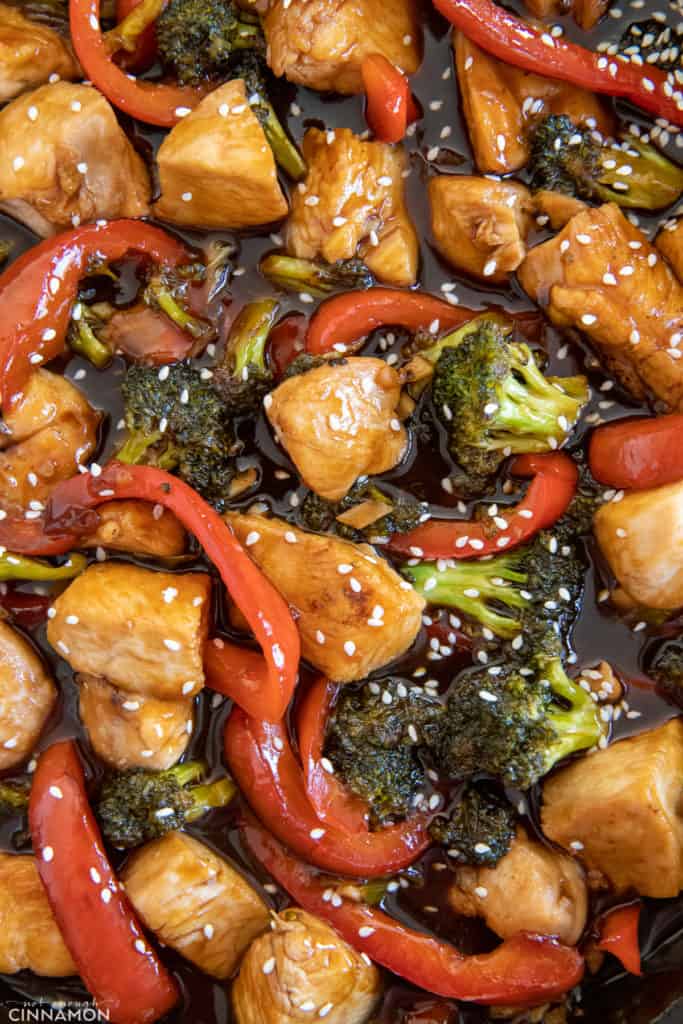chicken breast, broccoli and bell pepper in sweet hot honey sauce sprinkled with sesame seeds