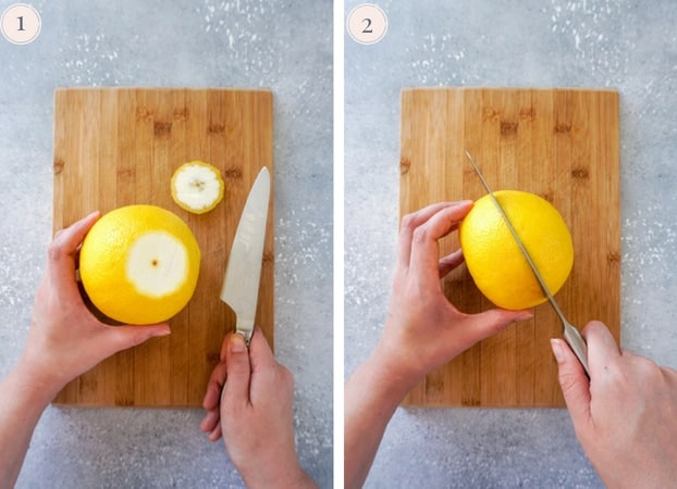 Grapefruits being cut on a cutting board