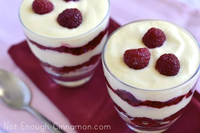 Easy Raspberry Tiramisu served in 2 glassed with fresh raspberries on top