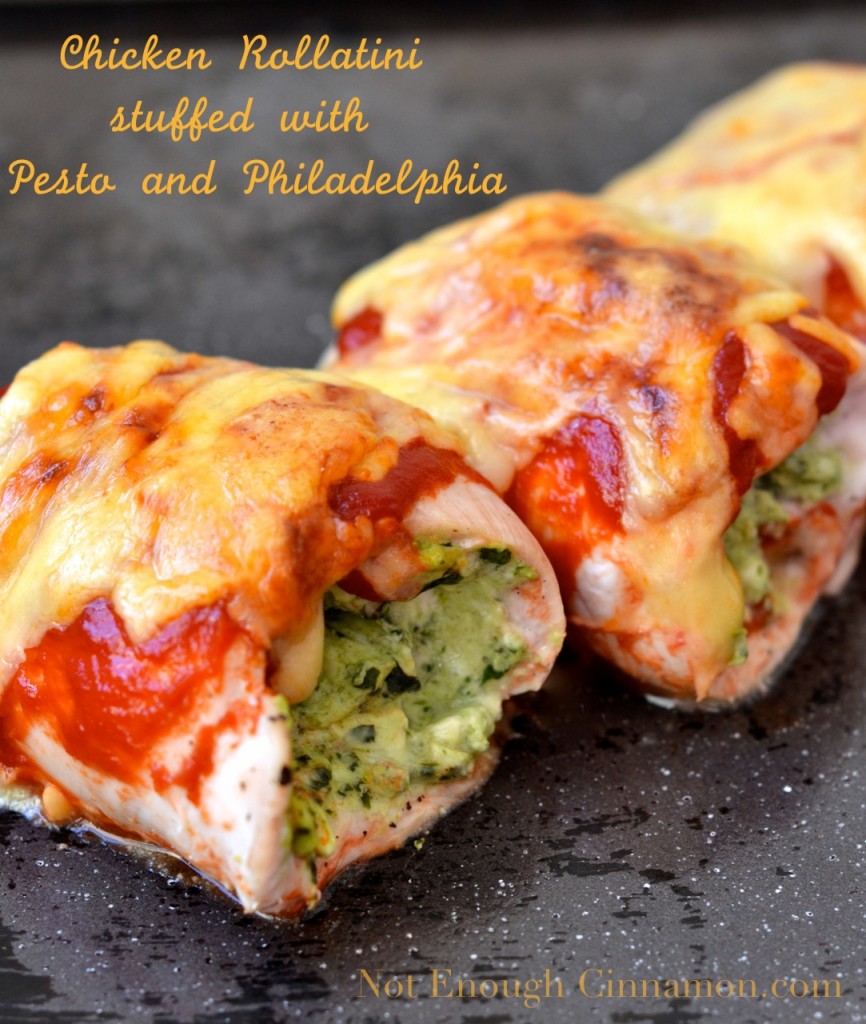 Pesto and Cream Cheese Stuffed Chicken Rollatini smothered with marinara sauce and mozzarella