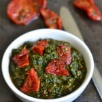 Basil and Sun-dried Tomatoes Pesto served in a white bowl