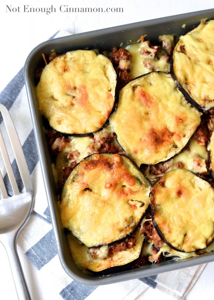 Beef and Eggplant Casserole with plenty of melted mozzarella on top served in a casserole dish 