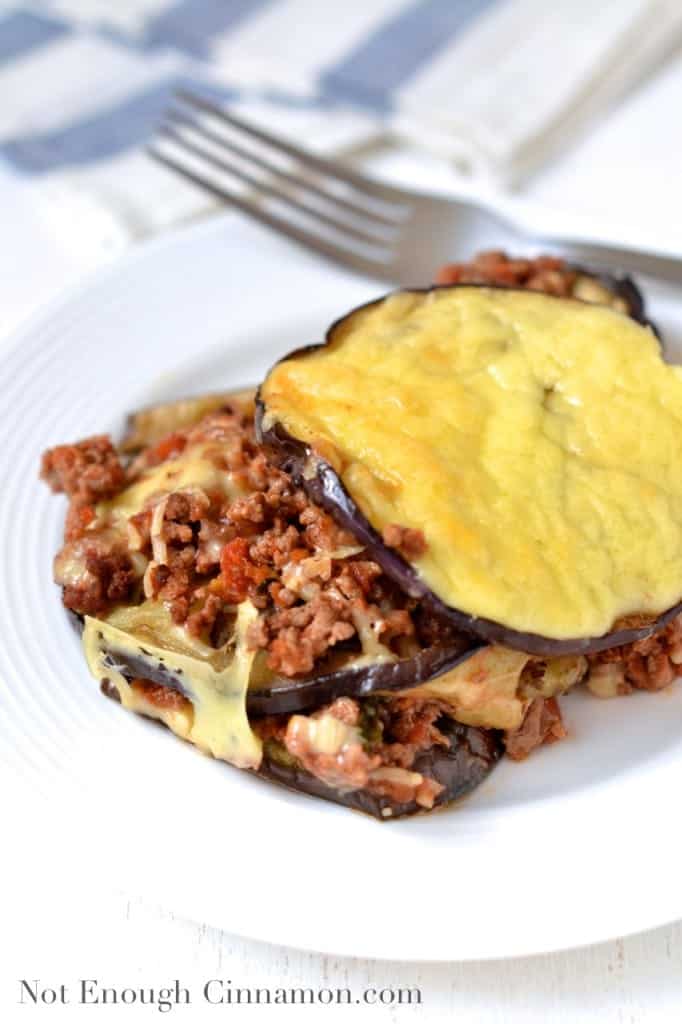 Beef and Eggplant Casserole with plenty of melted mozzarella on top served in a casserole dish 