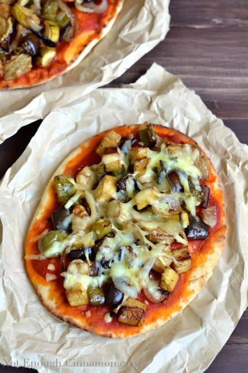 overhead shot of Gourmet Roasted Vegetable Pizza with Vegetable Pizza Toppings served in crinkled parchment paper