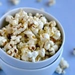 Homemade stovetop popcorn sprinkled with blue cheese and parmesan. To die for! - recipe on NotEnoughCinnamon.com