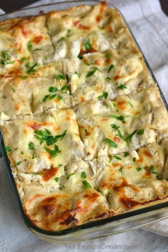 Skinny Chicken Alfredo Lasagna - As delicious as the original, half the calories! | Find the recipe on NotEnoughCinnamon.com