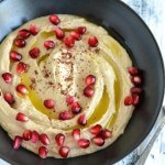 Super Simple Homemade Hummus with Pomegranate. It's seriously better than the storebought one! | Find the recipe on NotEnoughCinnamon.com