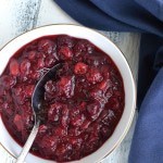 Try this low-sugar cranberry sauce this Thanksgiving. Sweetened with orange juice, apple and brown sugar, it's so much better than the canned stuff! | Find this recipe on NotEnoughCinnamon.com #holidays #thanksgiving