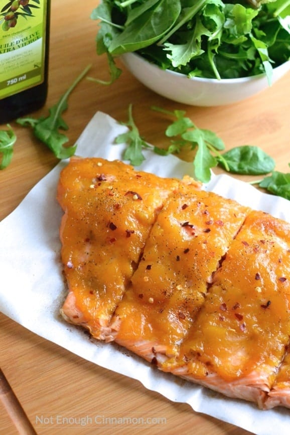 Baked salmon topped with a quick and easy mango jam. A great combination for a delicious and healthy dinner! | Find the recipe on NotEnoughCinnamon.com #glutenfree #paleo3