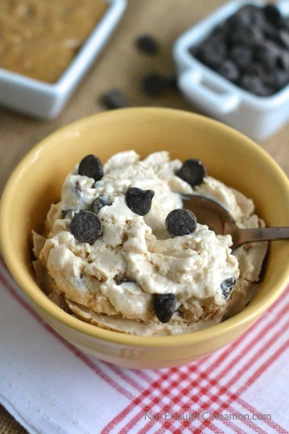 Peanut Butter Cups Healthy Frozen Yogurt in a yellow bowl with chocolate chips sprinkled on top