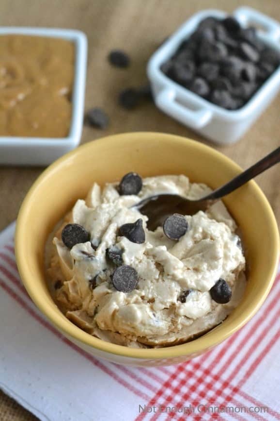 Peanut Butter Cups Healthy Frozen Yogurt served in a yellow bowl with some chocolate chips sprinkled on top