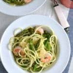 Shrimp Zucchini Pasta made with spiralized zucchini, asparagus, peas and yummy shrimps! Fulls of veggies and delicious. Click to see the recipe! NotEnoughCinnamon.com