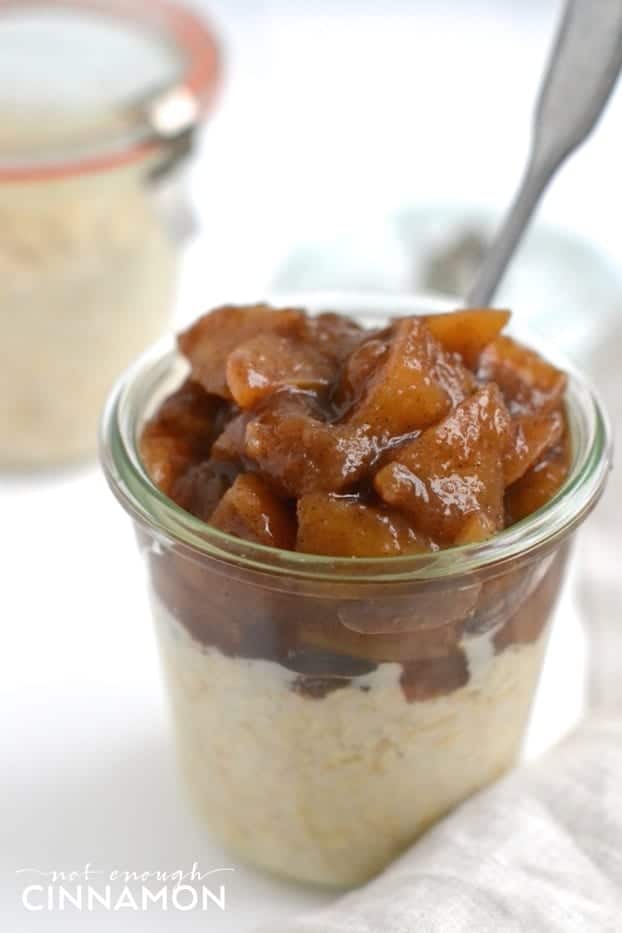 Side view of Clean Eating Apple Pie Overnight Oats in a small mason jar 
