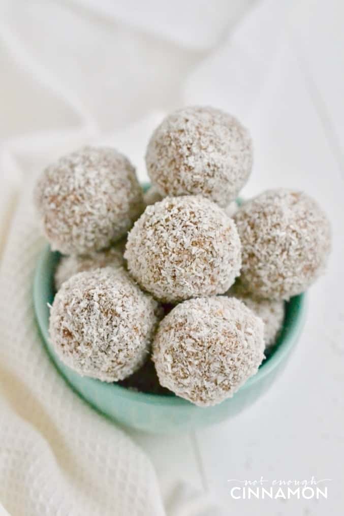 close-up of mint coloured bowl of sugar-free paleo banana bread energy bites