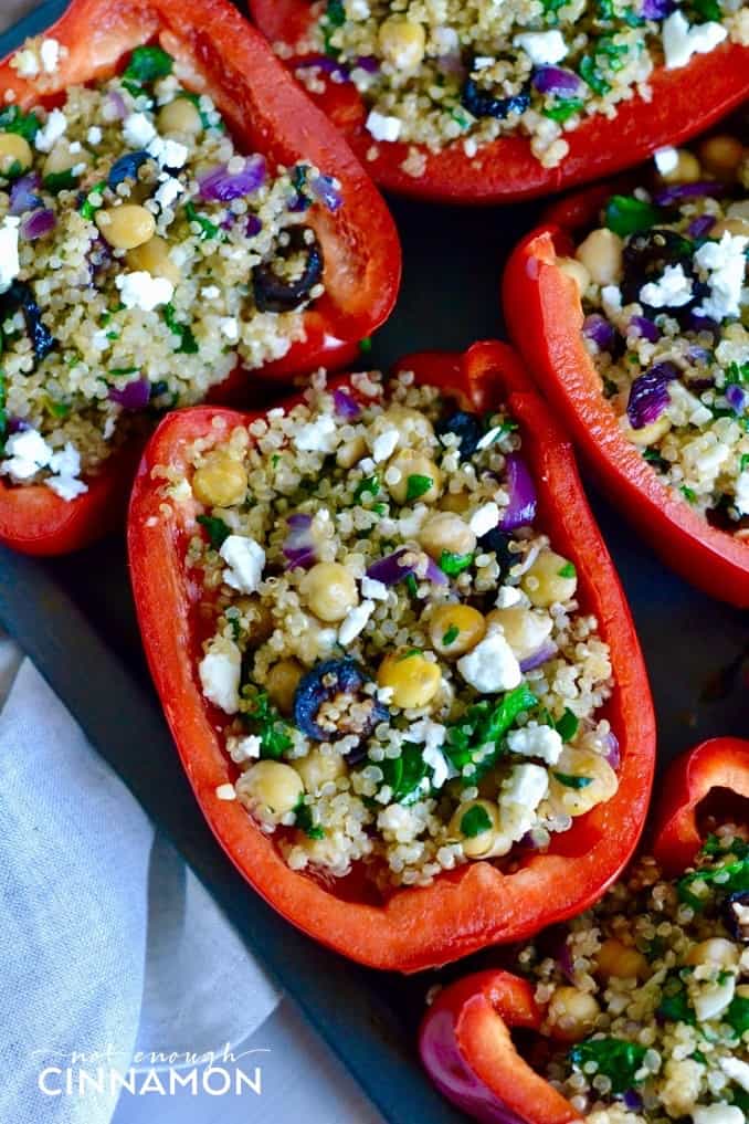 Greek Style Quinoa Stuffed Peppers - A delicious and healthy vegetarian meal. Find the recipe on NotEnoughCinnamon.com