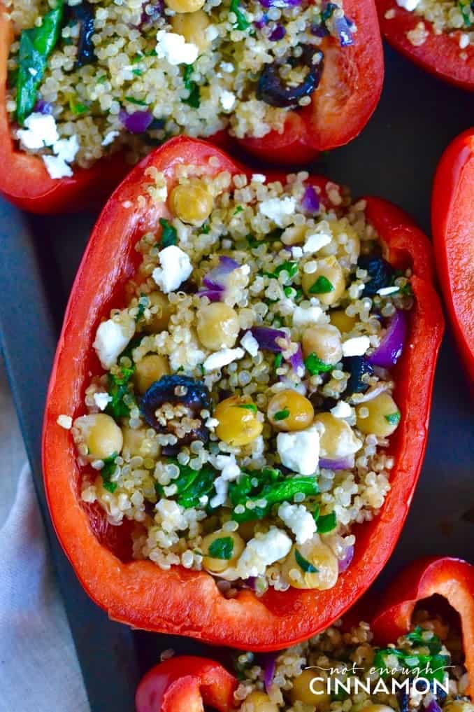 Greek Style Quinoa Stuffed Peppers - A delicious and healthy vegetarian meal. Find the recipe on NotEnoughCinnamon.com