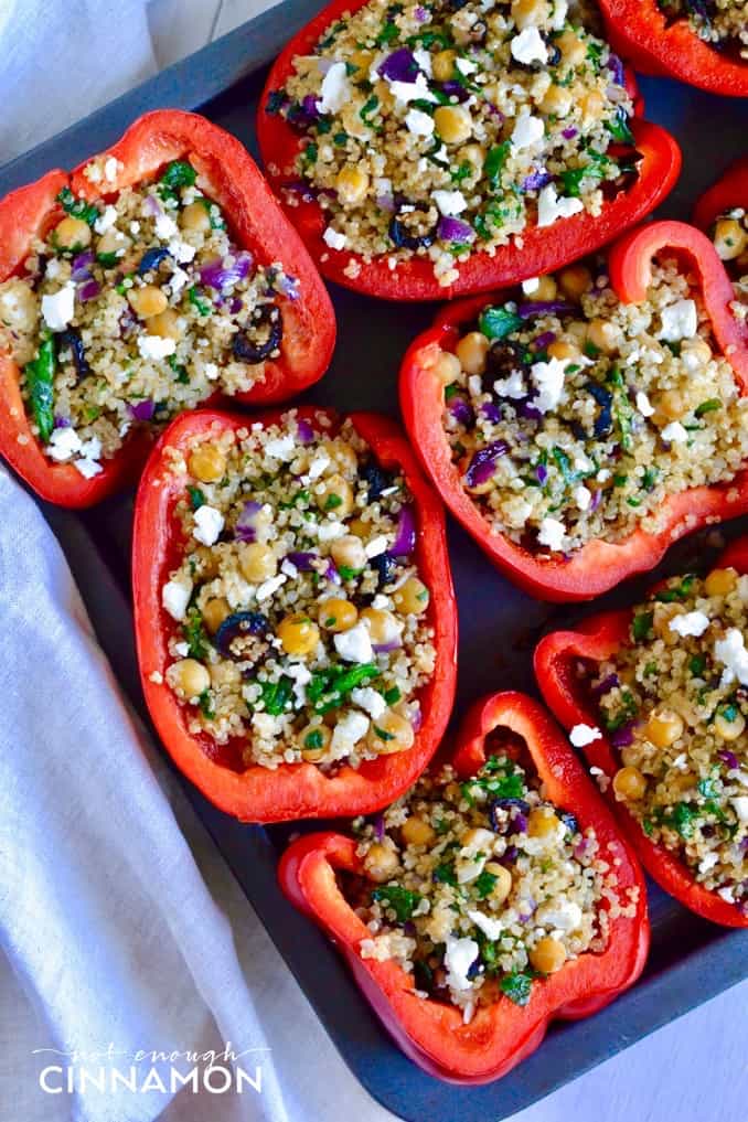 Greek Style Quinoa Stuffed Peppers - A delicious and healthy vegetarian meal. Find the recipe on NotEnoughCinnamon.com