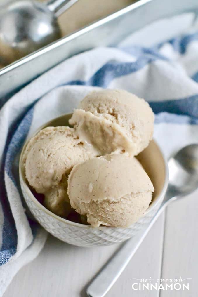 3 scoops of No-Churn Banana Cinnamon Greek Yogurt Ice Cream in a white bowl