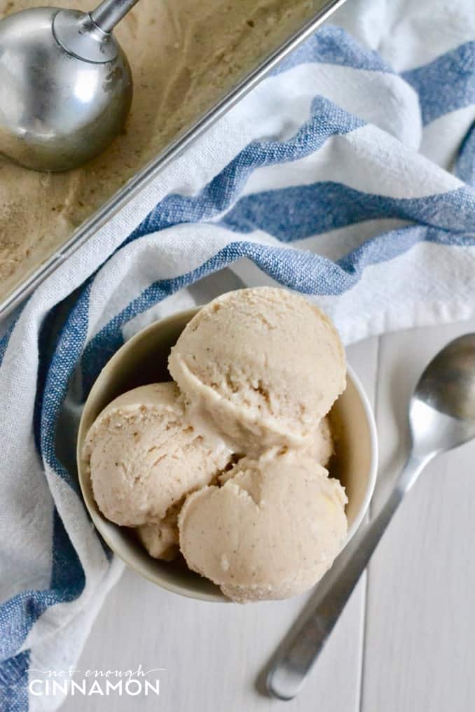 3 scoops of No-Churn Banana Cinnamon Yogurt Ice Cream in a small white bowl