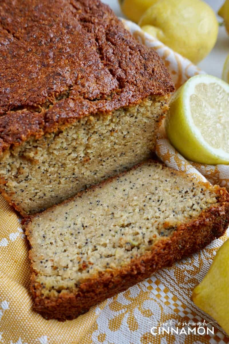 close-up of a loaf of paleo zucchini bread with one slice cut off