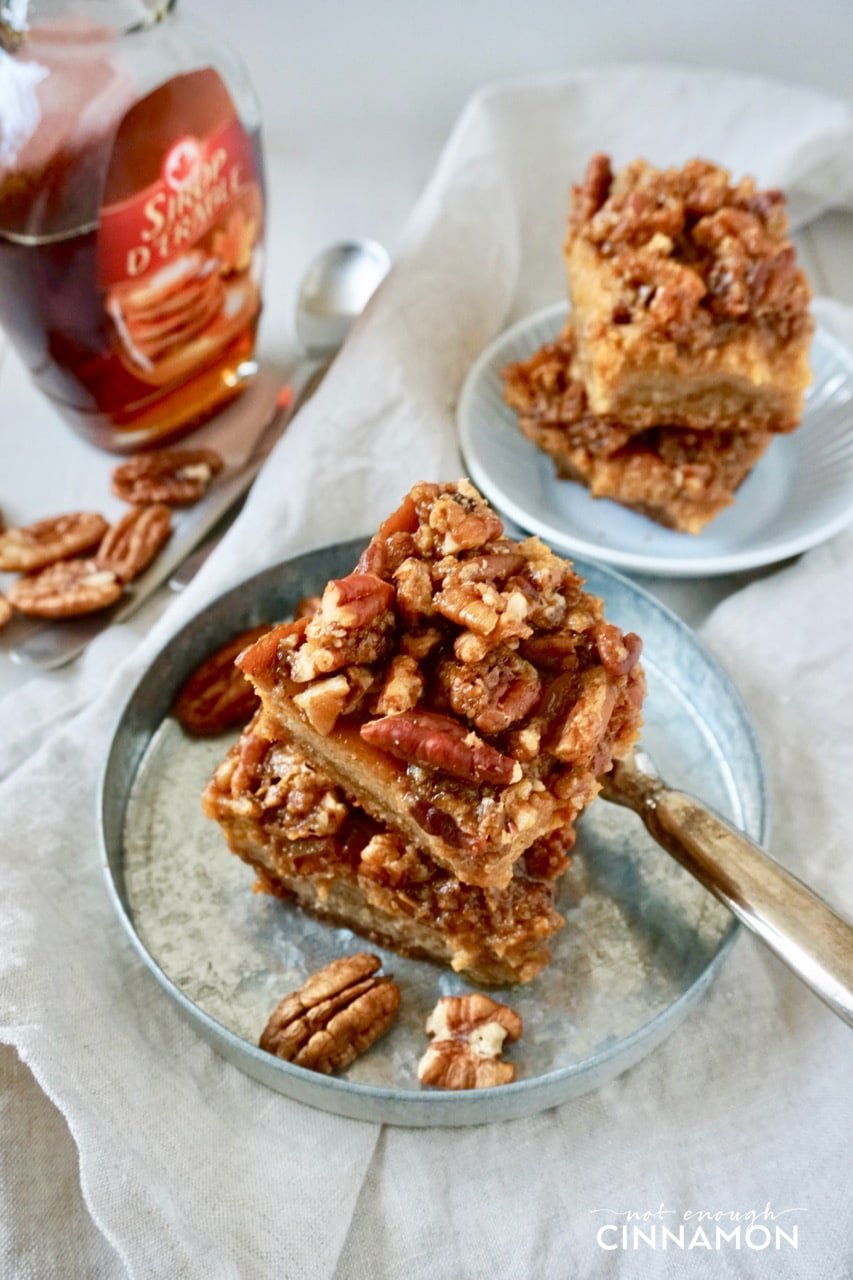 overhead shot of a stack of Healthy Pumpkin Pecan Bars on a metal plate