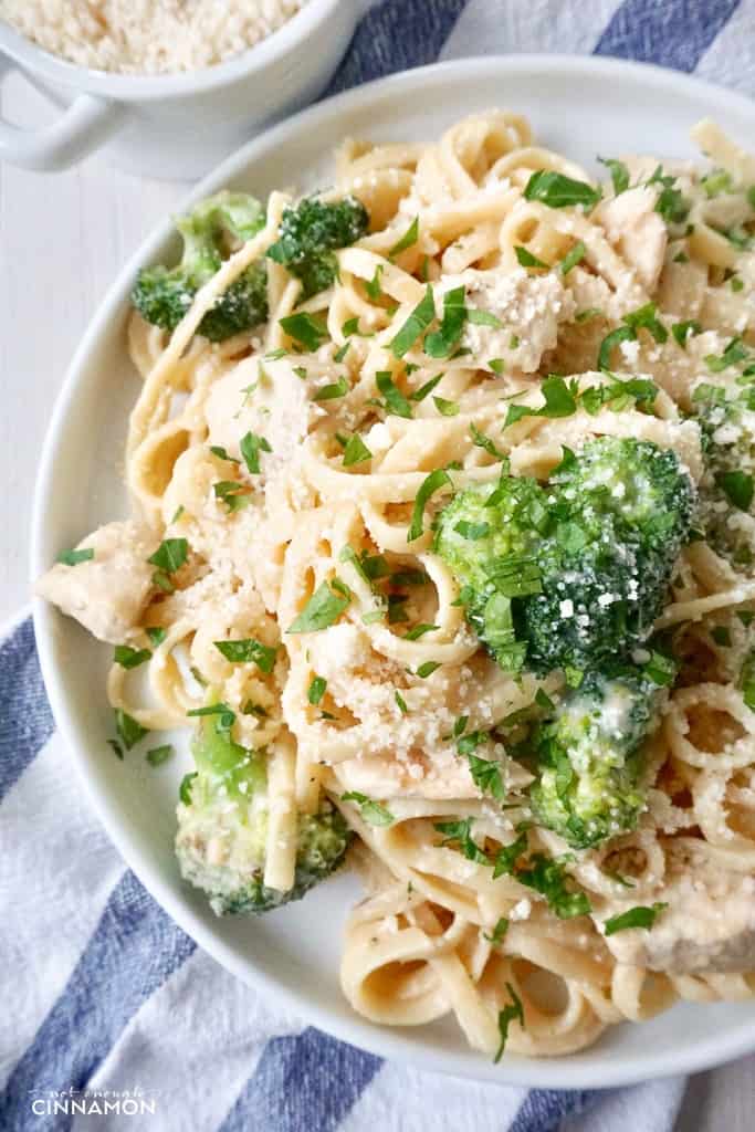 close-up of healthy chicken and broccoli pasta tossed with cauliflower Alfredo sauce