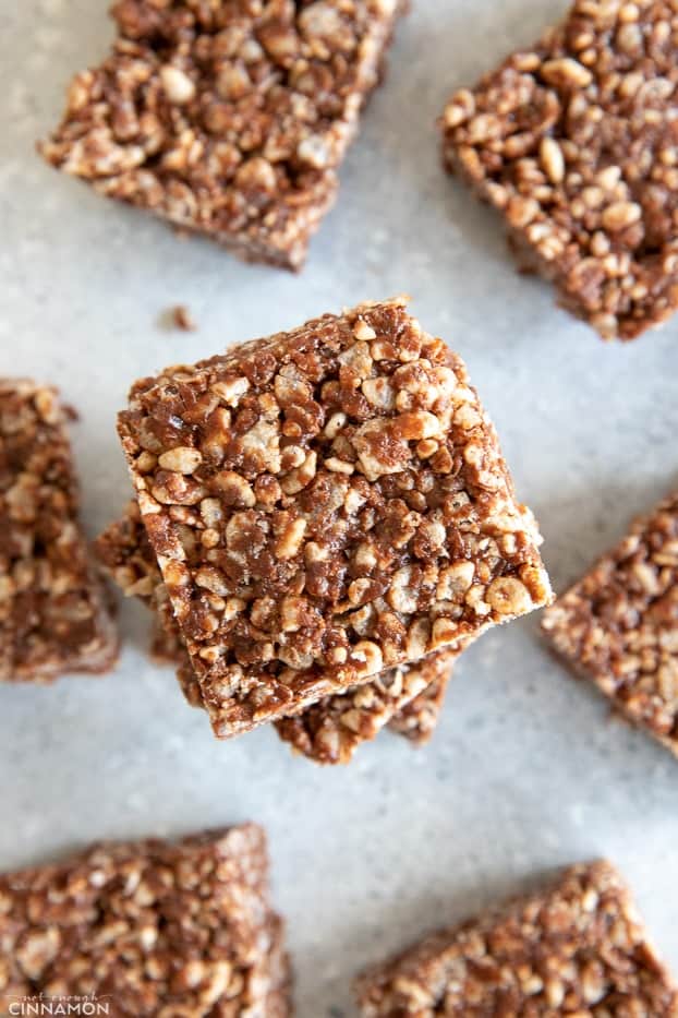 Rice krispies treats squares on a grey white background