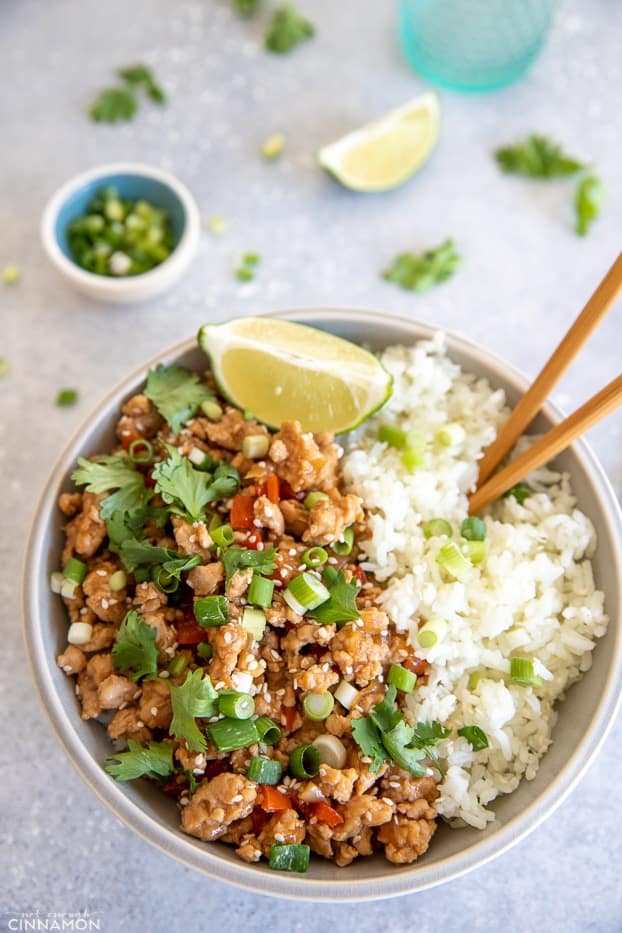 overhead shot of Asian Ground Turkey Rice Bowl with chopsticks stuck into the rice