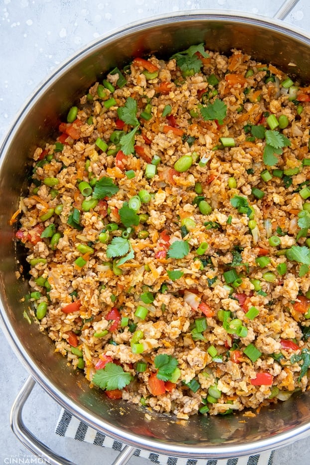 overhead shot of a big pot filled with healthy Asian fried rice 