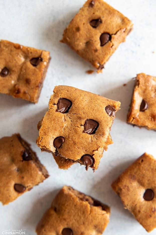 overhead shot of healthy almond butter blondies on a kitchen counter