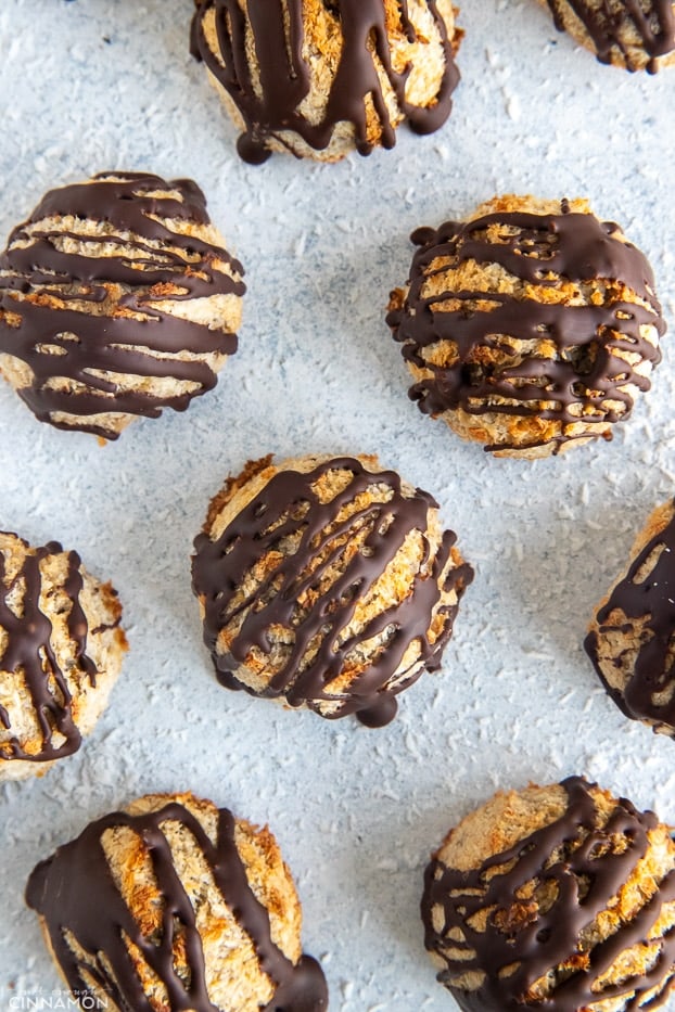overhead shot of healthy coconut macaroons drizzled with dark coconut oil chocolate