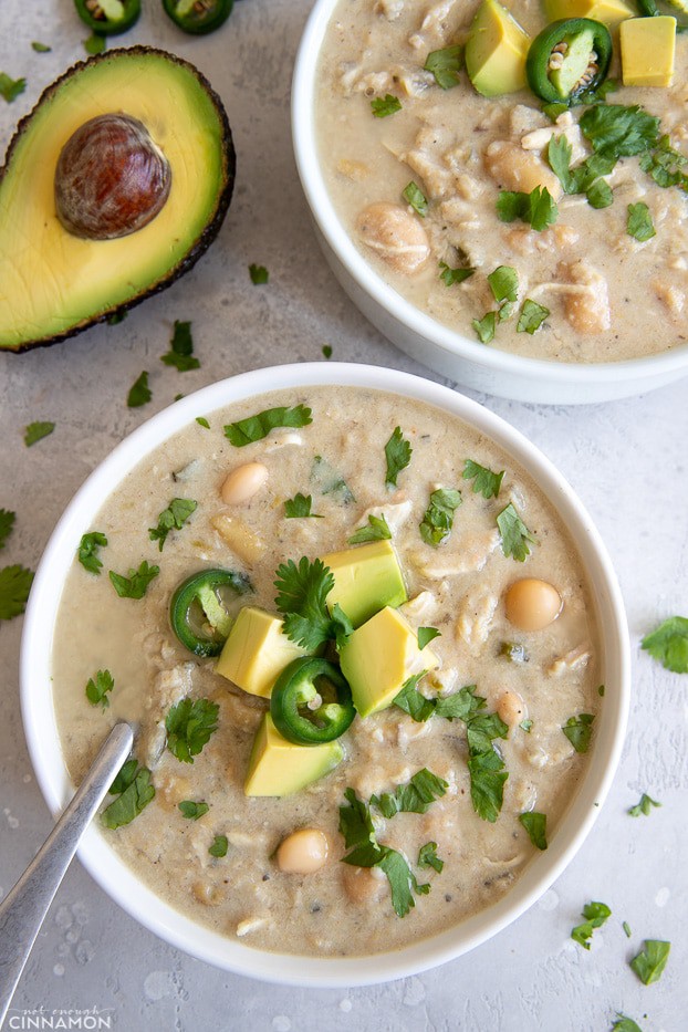 overhead shot of two bowls of healthy Mexican slow cooker white chicken chili 