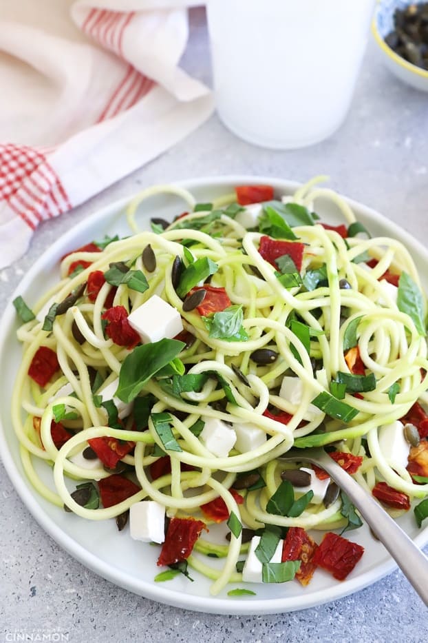 side shot of a plate of zucchini noodle salad