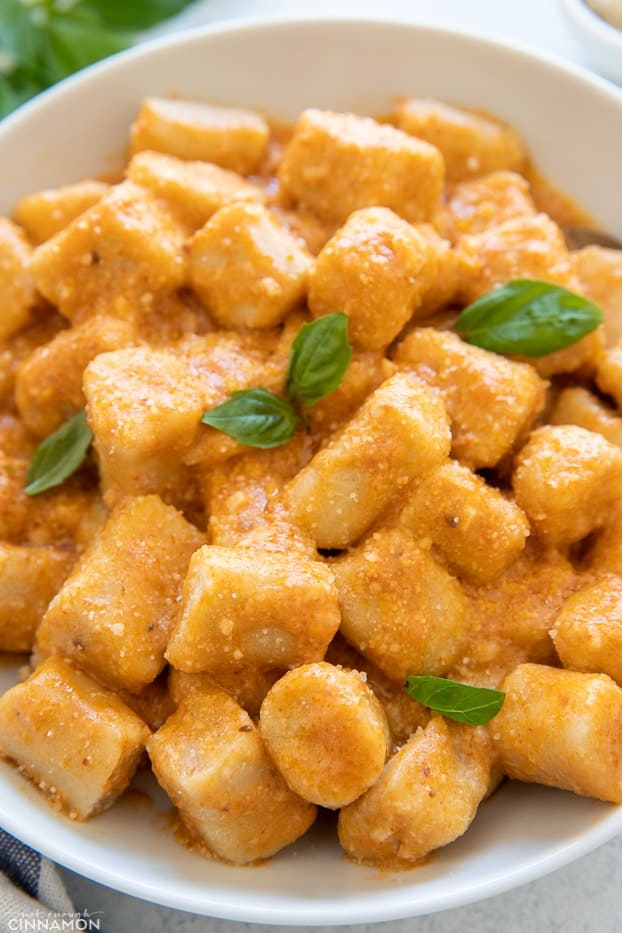 close-up shot of homemade Trader Joes Cauliflower gnocchi tossed with sun-dried tomato paste