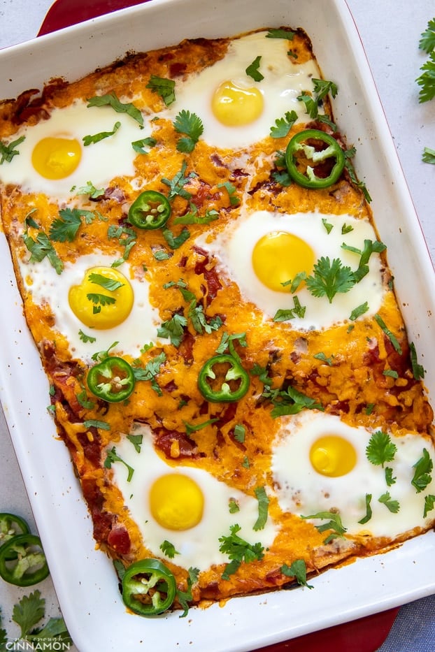 overhead shot of a healthy Mexican breakfast casserole with eggs, beans and salsa