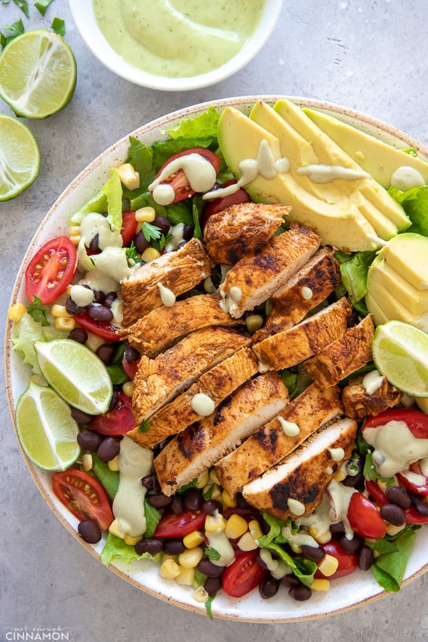 overhead shot of Southwestern Chicken salad drizzled with avocado ranch dressing 