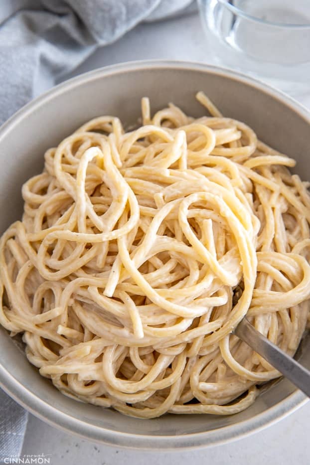 a bowl with creamy vegan lemon tahini pasta