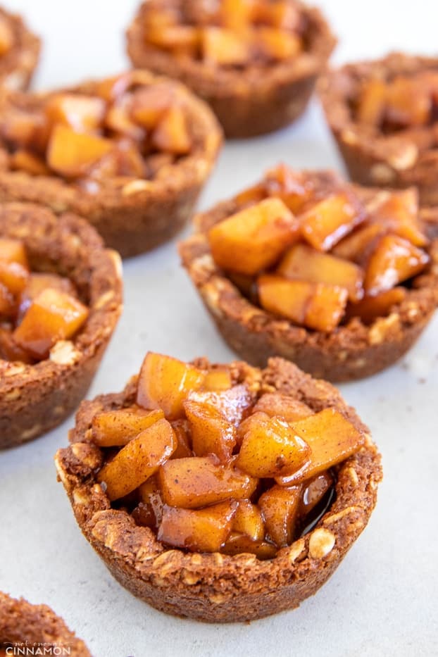 side view of healthy apple cookie cups on a kitchen table 