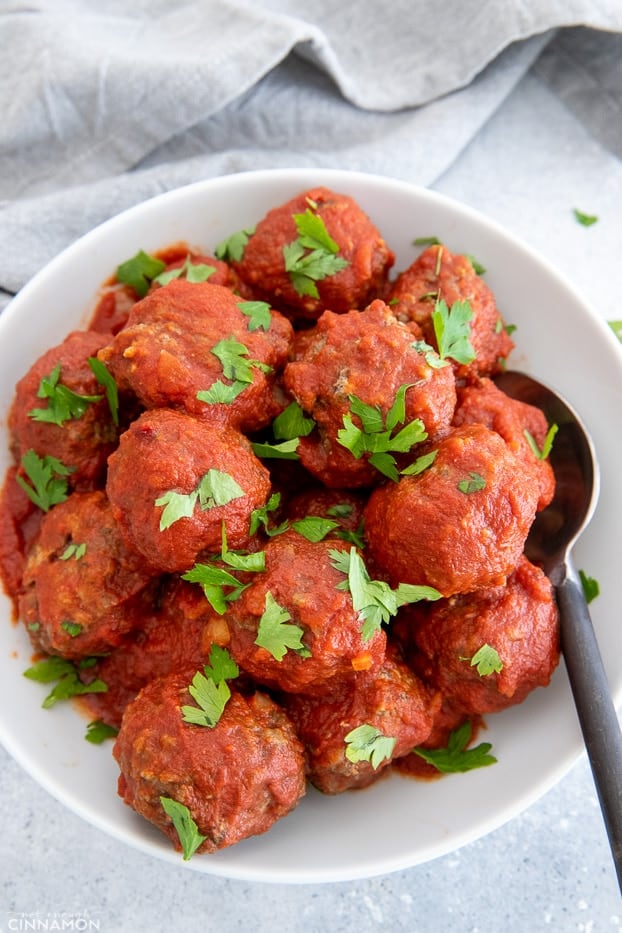 overhead shot of Slow Cooker Italian Meatballs served in tomato sauce 